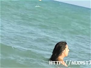 wondrous naturist femmes are grabbed on camera on a beach